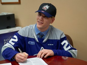 Nathan Villeneuve signs with the Sudbury Wolves.