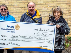 From left, Walkerton Rotary Club director of innovation Bonne Noble, secretary Don Moore and president Nina McTeer present a $5,000 donation to the Rotary Disaster Response Fund. Rotary International uses this fund to provide support for those effected by crisis.