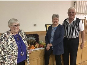 Shirley Bieman and Wendy Cox, organizers of the Good Food Box program in Kincardine stand with Bill Pike, with 100peoplewhoshare.