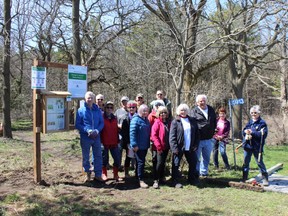 Members of the Huron Fringe Field Naturalists stand with the new signage following a cleanup event at the George G Newton Nature Reserve near Goderich April 22, 2022.