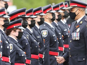 New Ottawa Police recruits during a badge ceremony held Sept. 29, 2021. Credit: Jean Levac/ POSTMEDIA