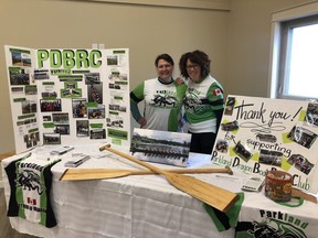 Sherry Dykes (left) and Cheryl Roose of the Parkland Dragon Boat Racing Club were at the Carvel Easter Market Apr. 9 to spread awareness and recruit new members for the club. (Ashley Orich)