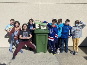 The Ecole Parc composting team (L-R) Madeline Black, Laura Derksen, Avery Possberg, Dylan Currie, Jace Weinrich, Finnley Poulin, Gavyn McAleer, Kessiah Crispin. Photo supplied.