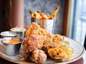 New entrées include honey-brined fried chicken with house slaw, fries and sauces. SUPPLIED