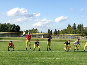 Members of the bantam Stony Plain Bombers practice drills Thursday, Aug. 8, 2019. Evan J. Pretzer