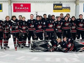 The Airdrie Xtreme take a group photo on the ice in Fort Saskatchewan, exhausted yet in high spirits after their run in the Hockey Alberta Provincials. Photo courtesy of Tyson Soloski/The Airdrie Xtreme.