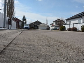 Street sweeping operations are expected to begin April 26, weather permitting. Residents are asked to look for the orange signs at the entrances to their communities to know when their street is scheduled and to park their cars elsewhere while crews work. Photo by Riley Cassidy/The Airdrie Echo/Postmedia Network Inc.