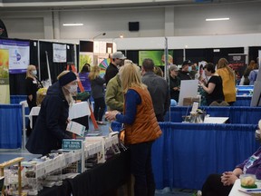 Attendees browse the various exhibits showcasing local businesses during the Airdrie Chamber of Commerce's Home and Lifestyle Show at Genesis Place on April 23, 2022.