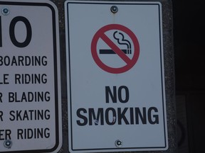 A no smoking sign outside of a building in Airdrie. Council debated the prospect of restricting cigarettes and vapes to the same levels as cannabis during the April 19 council meeting. Photo by Riley Cassidy/The Airdrie Echo/Postmedia Network Inc.