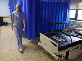 Registered nurse Courtney Benoit walks through the special care unit of Campbellford Memorial Hospital Feb. 10. The unit and others in the hospital lack the space in which to conform to modern isolation requirements, emphasizing the need for a new building.