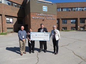 Members of the Campbellford Memorial Hospital Auxiliary present a cheque for $32,000 to hospital and foundation officials. From left were John Russell, CMH Foundation executive director; Robbie Beatty, auxiliary co-president; Eric Hanna, CMH interim chief executive officer and president; and Maureen Marvin, auxiliary co-president.