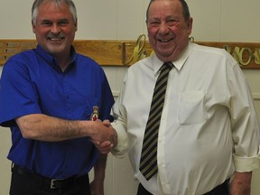 Norwood Legion Ordinary Member John Fleming (right) is congratulated and thanked by Norwood Legion President Kevin English for his many years of service to the local branch. John received his 55 year service pin and bar during Branch 300's April 24, Honour and Awards Presentations. SUBMITTED PHOTO