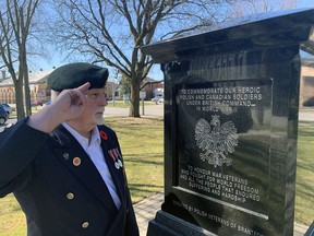 Zig Misiak, of the Brantford branch of the Polish Combatants Association, salutes a memorial in Tom Thumb Park that was erected in 2018 in memory of those who served in the Second World War. The association will celebrate its 75th anniversary at the Canadian Military Heritage Museum on May 15.