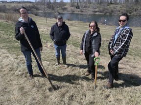 Louise Heyming (left), of the Grand River Conservation Authority, Chuck Beach, of the Brant Tree Coalition, and Heather Dover and Hailey Kim, of Brantford's forestry department, are gearing up for a community tree-planting at Savannah Oaks Pond in the city's northwest industrial area on April 24 as part of the Earth Week celebration.