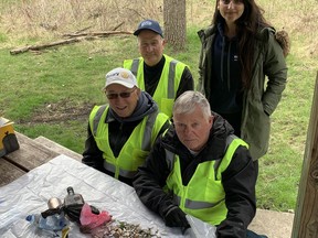 Gagan Batra, manager, business support and sustainability at the City of Brantford, Mayor Kevin Davis, Councillor John Utley and Reg Madison, of the Rotary Club of Brantford, spent Saturday morning picking up discarded cigarette butts and other trash at the Rotary Bike Park off of Grand River Avenue. The clean-up was one of several that took place in the city as part of the community's Earth Week activities. VINCENT BALL
