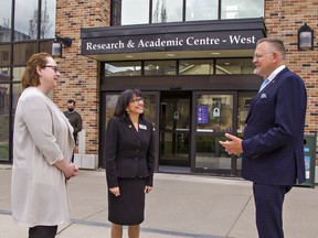 Wilfrid Laurier University's president and vice-chancellor Deborah MacLatchy (left) and Maria Cantalini-Williams, dean of the faculty of education speak with Brantford-Brant MPP Will Bouma on Tuesday April 26, 2022 at the university's campus in downtown Brantford, Ontario.