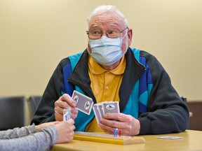 Don Lee plays cribbage on Wednesday April at the Beckett Recreation Centre in Brantford which re-opened Monday after 25 months due to the pandemic. Brian Thompson