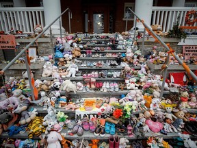This photo from last November shows children shoes and stuffed animals set on the steps to the former Mohawk Institute in Brantford as a tribute to the missing children of residential schools. An announced visit to Brantford by the Archbishop of Canterbury to visit with residential school survivors now is uncertain, according to a spokesman for the Anglican Church of Canada.