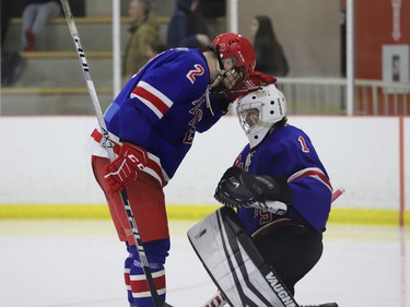 With game four of the Jr. C championship series tied 2-2 entering the third period and the Rangers needing a victory to keep their season going, South Grenville defenceman Nate Medaglia offers encouragement to goalie Ben Spicer. 
Tim Ruhnke/The Recorder and Times/Postmedia Network