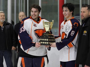 Corey Camirand and Jacob Servant of the Clarence Castors hold the NCJHL championship trophy at Ingredion Centre in Cardinal on Saturday, April 2, 2022.
Tim Ruhnke/The Recorder and Times