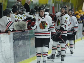 Ryan Bonfield is congratulated by his Brockville teammates on the bench after scoring his 32nd goal of the season on Friday night. Bonfield has been named to the CCHL 2nd All-Graduate Team.
Tim Ruhnke/The Recorder and Times