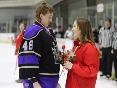 Second star Warren Halpenny of the Kings and medal presenter Mallory Kirkby share a moment at the end of the RSL-South Grenville game Saturday afternoon.
Tim Ruhnke/The Recorder and Times