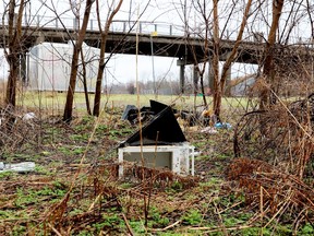 Refuse is strewn across a vacant city lot at the end of Louis Street that is being studied for an affordable housing development. (RONALD ZAJAC/The Recorder and Times)