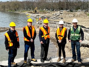 Left to right, Front of Yonge Township Mayor Roger Haley and Leeds-Grenville-Thousand Islands and Rideau Lakes MPP Steve Clark meet with St. Lawrence Parks Commission Chairman Bob Runciman, SLPC CEO and general manager Hollee Kew and local contractors at Brown's Bay Beach on Monday to observe progress of the revitalization project underway. (SUBMITTED PHOTO)