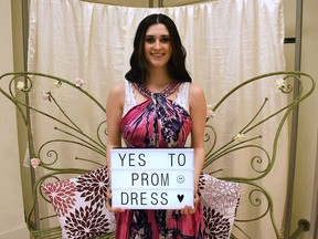 Savannah Lyons-Robinson, a Grade 12 student from Chatham-Kent Secondary School, tried on dresses on FreeHelpCK's annual prom dress giveaway at the Downtown Chatham Centre.  (Tom Morrison/Chatham This Week)