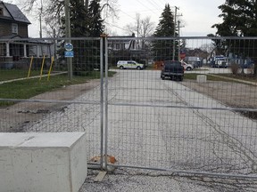 Shown is the new location of the fence on Foster Street in Wheatley after the evacuation zone was reduced on April 13. (Trevor Terfloth/The Daily News)