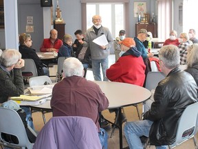 Ridgetown resident Tim DeActis speaks to local residents Saturday during a meeting to discuss concerns raised after news of a proposed 131-home subdivision on the east side of Ridgetown, meant to be a good news announcement, caught many people by surprise. PHOTO Ellwood Shreve/Chatham Daily News.