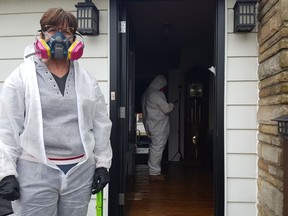 Wheatley resident Becky Lamb, of Foster Street, is dealing with sewage and mould in her home since returning. She's shown here on Wednesday, when the evacuation zone was reduced. (Trevor Terfloth/The Daily News)