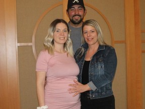 Jen Kobylka, left, has a special relationship with Michelle Heinhuis and her partner Brandon Babkirk, acting as a surrogate to give birth to their child, who is due the third week of August. (Ellwood Shreve/Chatham Daily News)