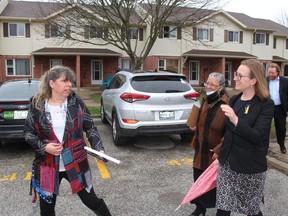 Renee Kominek, left, property manager of the Clairvue Housing Co-operative, gives a tour of the affordable housing community to federal Minister of Families, Children and Social Development, Karina Gould, right, and Tina Stevens, board president of Co-operative Housing Federation of Canada Tina Stevens on Wednesday afternoon. PHOTO Ellwood Shreve/Chatham Daily News