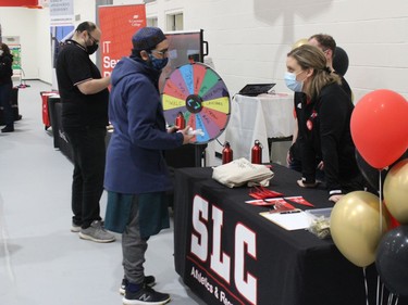 Questions and answers at one of the booths at the St. Lawrence College Open House. Photo on Saturday, April 2, 2022, in Cornwall Ontario.Todd Hambleton/Standard-Freeholder/Postmedia Network