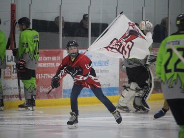 One of the North Dundas Demons minor hockey players who led the Rockets onto the ice finds himself skating in a sea of Islanders. Photo on Saturday, April 2, 2022, in Chesterville, Ontario.Todd Hambleton/Standard-Freeholder/Postmedia Network