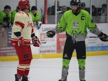 Gananoque captain and former NHLer Eric Selleck (right) exchanging comments with an opponent during a feisty first period. Photo on Saturday, April 2, 2022, in Chesterville, Ontario.Todd Hambleton/Standard-Freeholder/Postmedia Network
