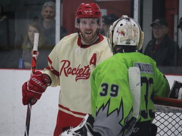 North Dundas player Mike McNamee chatting with the Gananoque goaltender a few minutes after his penalty shot attempt went awry. Photo on Saturday, April 2, 2022, in Chesterville, Ontario.Todd Hambleton/Standard-Freeholder/Postmedia Network