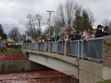 Spectators during the 2022 Raisin River Canoe Race on Sunday April 10, 2022 in South Stormont, Ont. Shawna O'Neill/Cornwall Standard-Freeholder/Postmedia Network