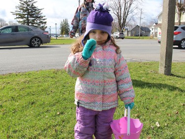 Aubry Thornton, three, of Morrisburg, looking forward to the start of the parade. Photo on Saturday, April 16, 2022, in Morrisburg, Ont. Todd Hambleton/Cornwall Standard-Freeholder/Postmedia Network