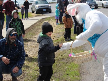 Treats from an Easter Bunny along the parade route. Photo on Saturday, April 16, 2022, in Morrisburg, Ont. Todd Hambleton/Cornwall Standard-Freeholder/Postmedia Network