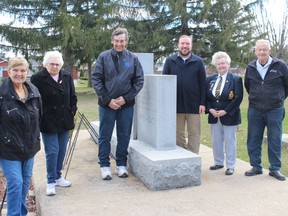 From left at the Iroquois Cenotaph are Sheila Holmes and Lorraine Robertson of the Iroquois Legion ladies auxiliary, Archie Mellan and Eric Duncan of the cenotaph committee, Darlene Riddell (legion president) and Jim Locke (cenotaph committee).Photo on Wednesday, April 20, 2022, in Iroquois, Ont. Todd Hambleton/Cornwall Standard-Freeholder/Postmedia Network