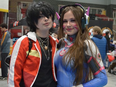 From left, Keith Cook cosplaying as Keith from Voltron and Emilia Fry cosplaying as Diva from Overwatch at CAPE 2022 on Saturday April 23, 2022 in Cornwall, Ont. Shawna O'Neill/Cornwall Standard-Freeholder/Postmedia Network