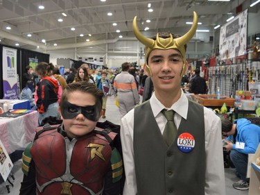 From left, Aeries Esslehall cosplaying as Robin and Keegan McClements cosplaying as President Loki at CAPE 2022 on Saturday April 23, 2022 in Cornwall, Ont. Shawna O'Neill/Cornwall Standard-Freeholder/Postmedia Network