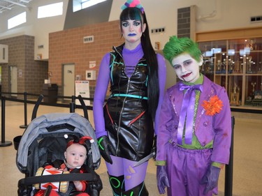 From left, Blake Labelle cosplaying as baby Harley Quinn, Leslie Labelle as Punchline, and Joker Tyson Labelle at CAPE 2022 on Tuesday August 24, 2021 in Cornwall, Ont. Shawna O'Neill/Cornwall Standard-Freeholder/Postmedia Network