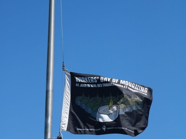 Lowering of the flag of the Canadian Labour Congress at the National Day of Mourning at Lamoureux Park on Thursday April 28, 2022 in Cornwall, Ont. Laura Dalton/Cornwall Standard-Freeholder/Postmedia Network