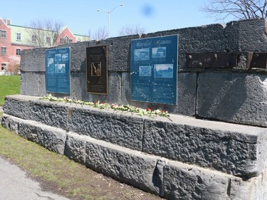 Roses laid on the worker's monument in Lamoureux park on Thursday April 28, 2022 in Cornwall, Ont. Laura Dalton/Cornwall Standard-Freeholder/Postmedia Network