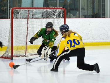 The Quebec Blizzards Chloé Beaubien takes a shot on Aberdeen Attackers Kennedy White during opening juvenile women's action at the 2022 Broomball Canada juvenile championships on Wednesday April 13, 2022 in Cornwall, Ont. The Blizzards won 1-0 in OT. Robert Lefebvre/Special to the Cornwall Standard-Freeholder/Postmedia Network