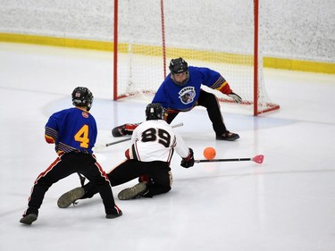 Blitz Charles-Antoine Cloutier tries to go five-hole on his knees against Embrun Panthers goaltender Fabien Leblanc during opening juvenile men's action at the 2022 Broomball Canada juvenile championships on Wednesday April 13, 2022 in Cornwall, Ont. The Blitz won 2-0. Robert Lefebvre/Special to the Cornwall Standard-Freeholder/Postmedia Network