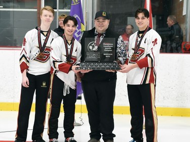 Blitz players accept their championship trophy at the 2022 Broomball Canada National Juvenile Championship on Saturday April 16, 2022 in Cornwall, Ont. They won the gold-medal match against the Warriors 3-0. Robert Lefebvre/Special to the Cornwall Standard-Freeholder/Postmedia Network